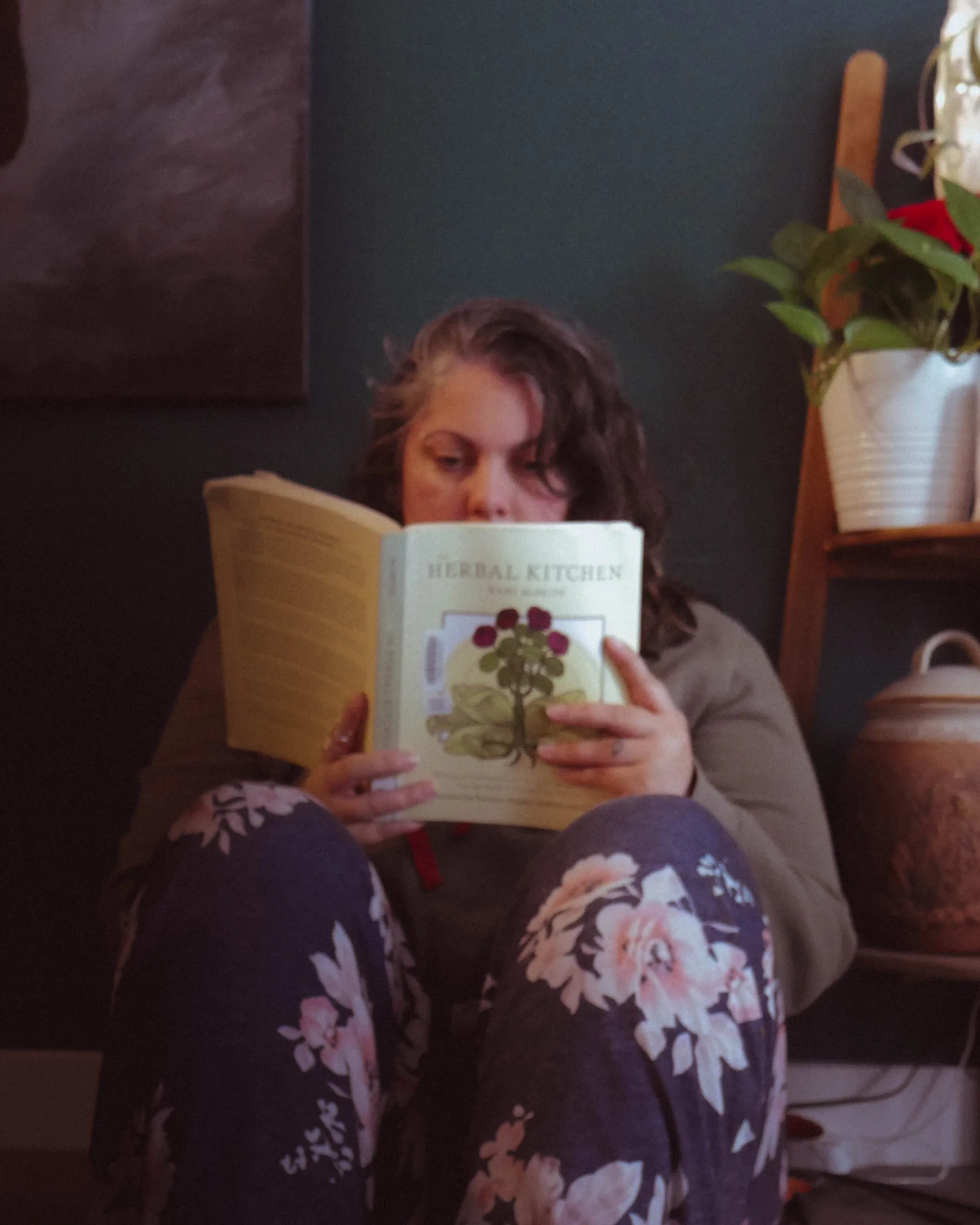 reading an herbal study book